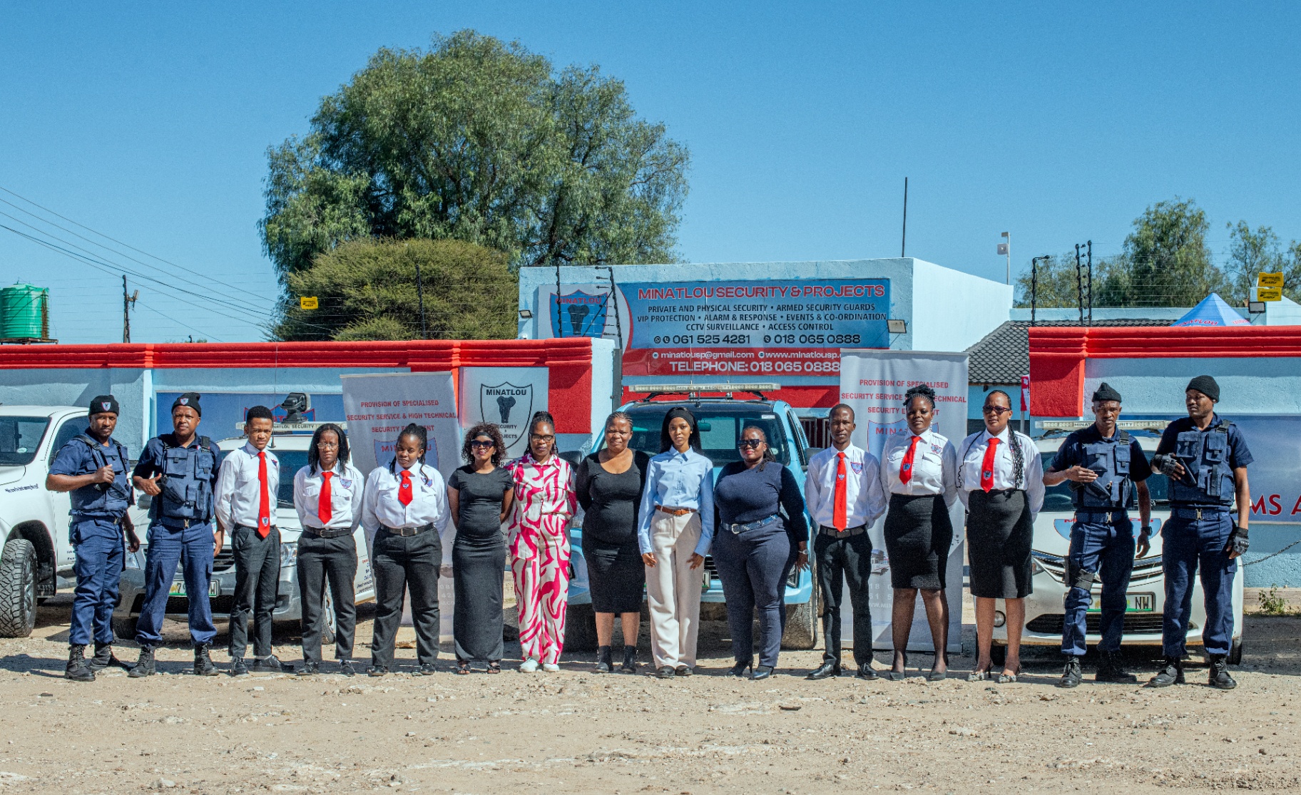 Minatlou Security & Projects team in front of company premises
